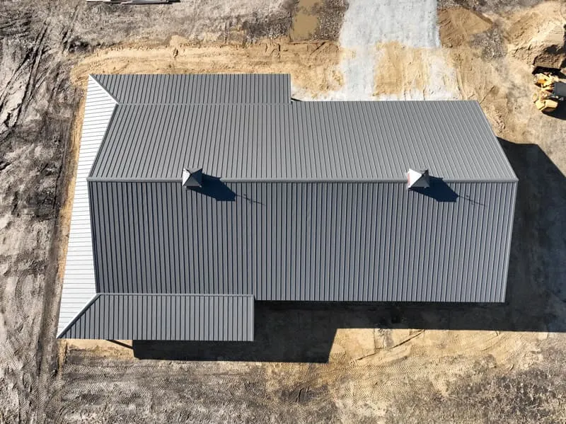 Large agricultural building with a steel roof